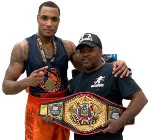 2022 Chicago & National Golden Gloves Super Heavyweight Champion, Eric Ross, with his coach, Rodney Wilson, a 1986, 1987 & 1988 Chicago Golden Gloves Champion.